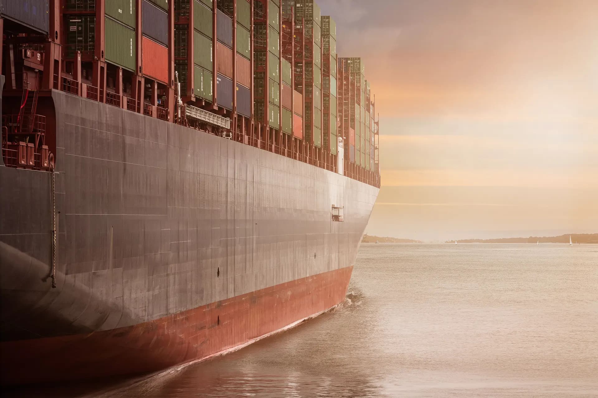 Container vessel carrying cargo on an international shipping route