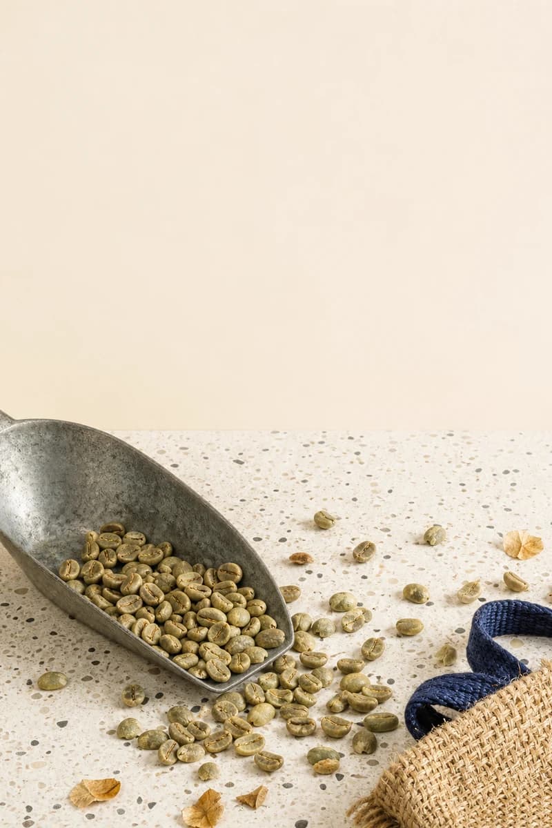 Unroasted Arabica Santos Good Cup beans spilling from a natural jute export sack