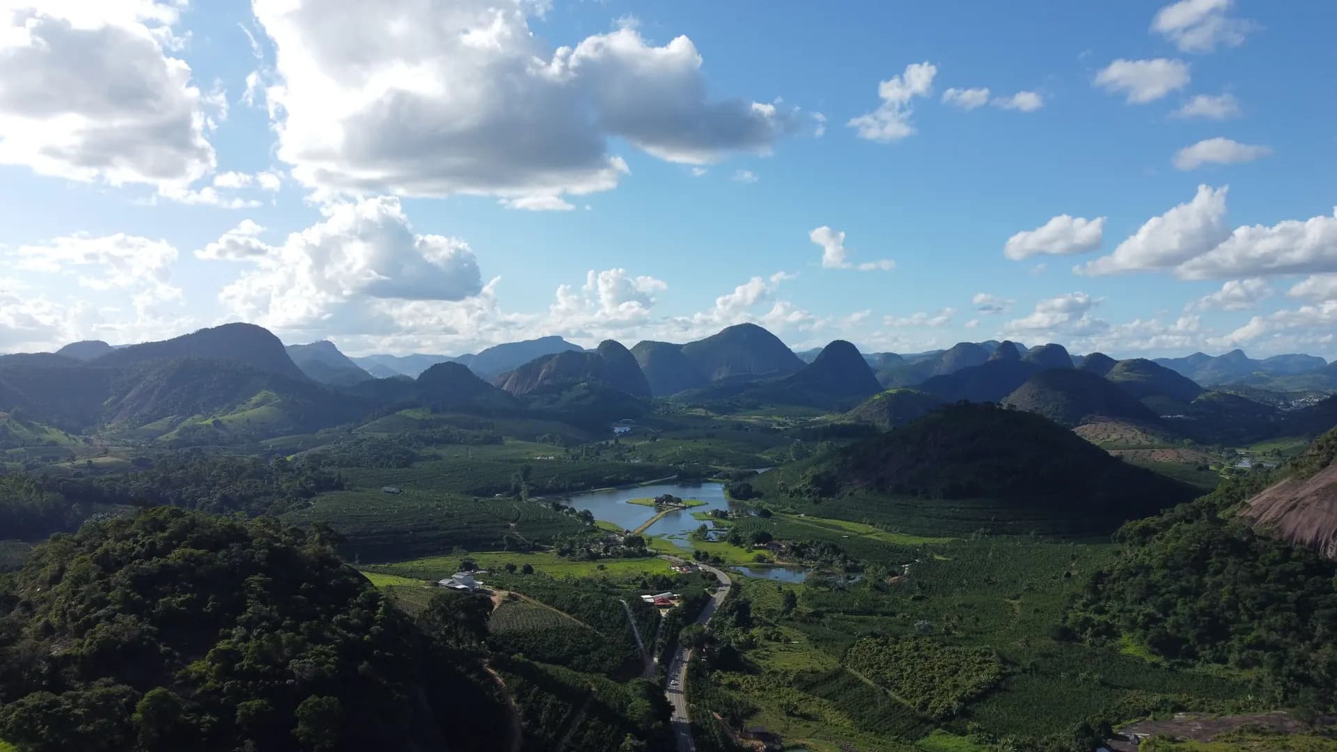 Arabica coffee farms across a Brazilian mountain valley