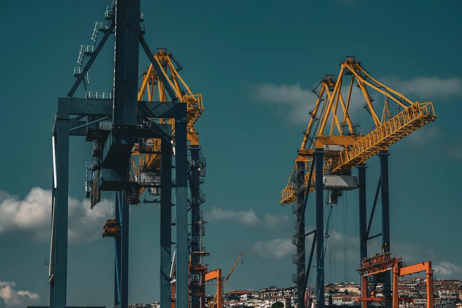 Port cranes and shipping containers at an Istanbul trade hub