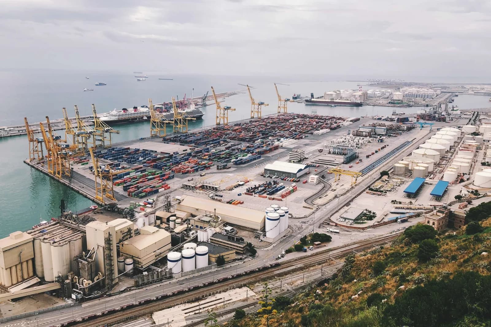 Commercial port with cargo terminals, storage tanks and loading infrastructure
