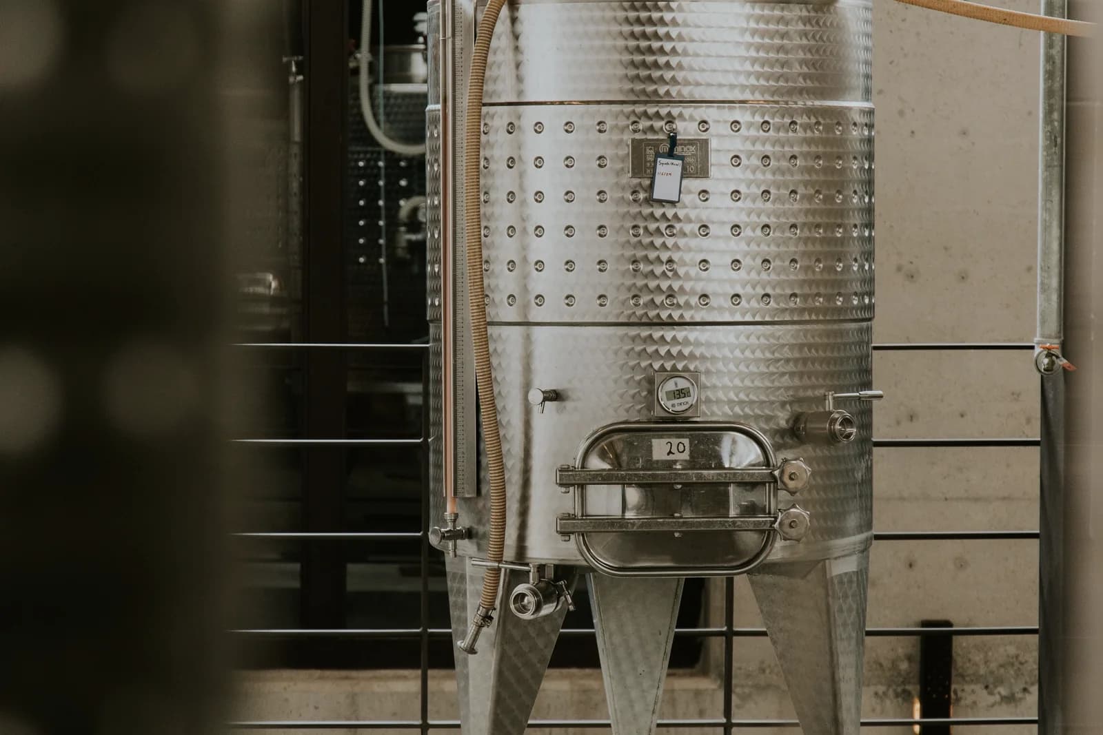 Stainless steel processing tank in a clean industrial facility