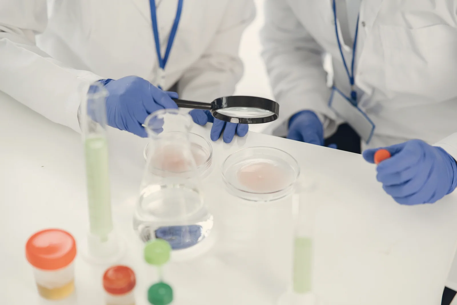 Laboratory team examining samples during a quality review