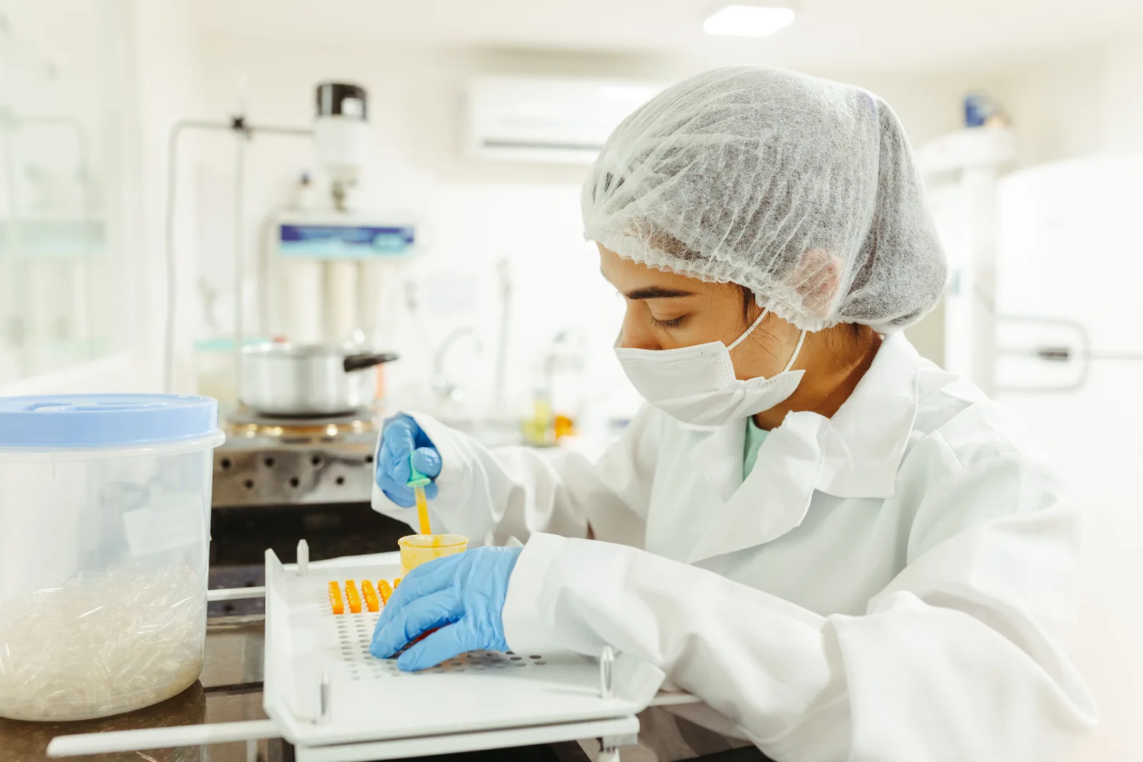 Laboratory specialist conducting food quality-assurance testing